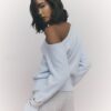Blå långärmad asymmetrisk fluffig topp