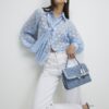 Blå organza-blus med prickar
