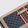Blå plånbok med monogramtryck och vävband på framsidan