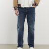 Blå raka tvättade jeans Blå raka tvättade jeans