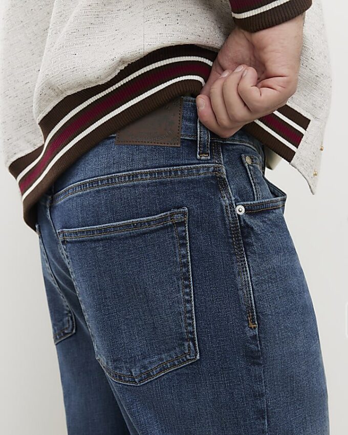 Blå raka tvättade jeans Blå raka tvättade jeans