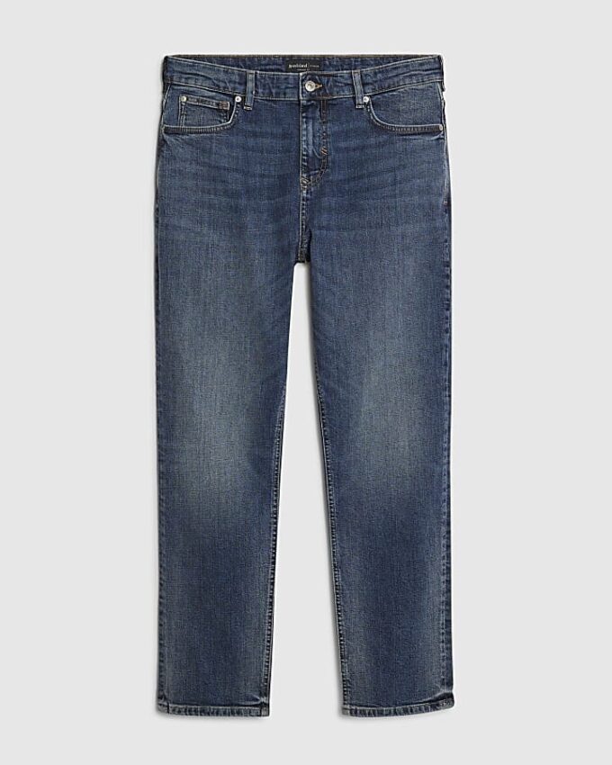 Blå raka tvättade jeans Blå raka tvättade jeans