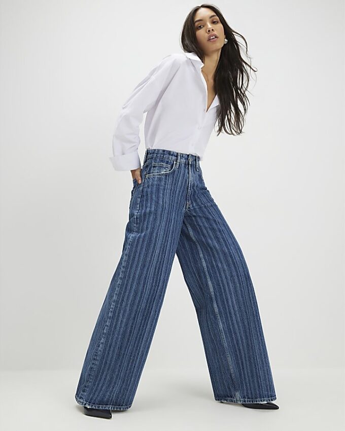 Blå randiga jeans med vida ben Blå randiga jeans med vida ben