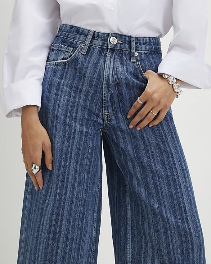 Blå randiga jeans med vida ben Blå randiga jeans med vida ben