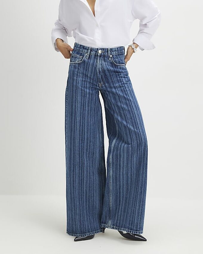 Blå randiga jeans med vida ben Blå randiga jeans med vida ben