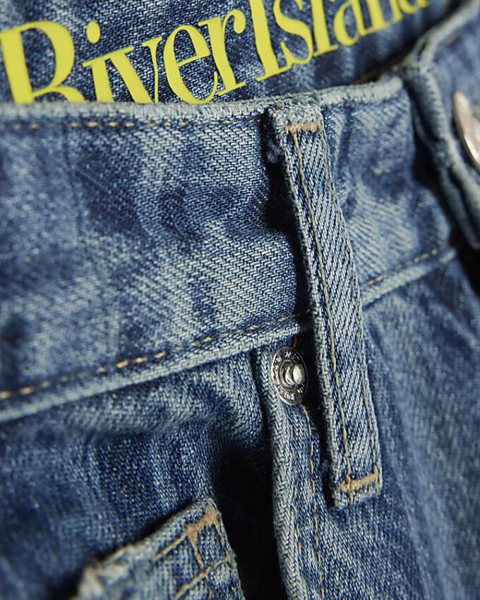 Blå randiga jeans med vida ben Blå randiga jeans med vida ben