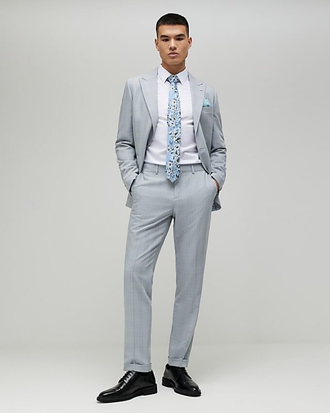 Blå slim fit-byxor med rutmönster Blå slim fit-byxor med rutmönster