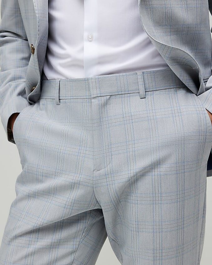 Blå slim fit-byxor med rutmönster Blå slim fit-byxor med rutmönster