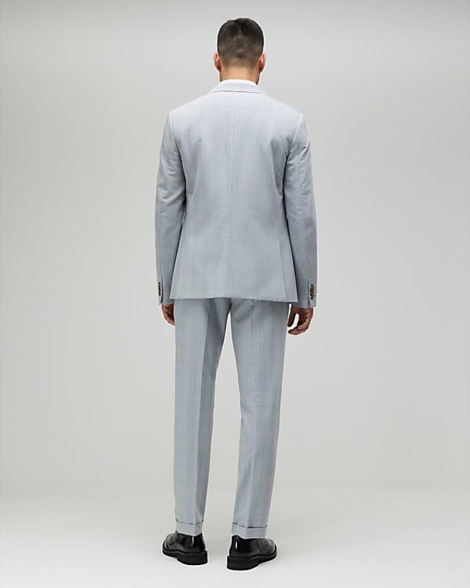 Blå slim fit-byxor med rutmönster Blå slim fit-byxor med rutmönster