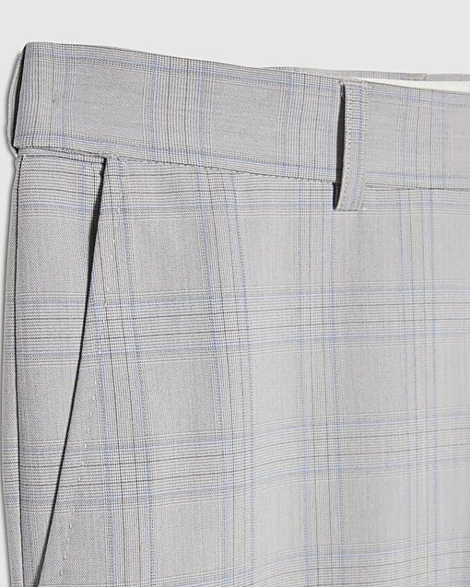 Blå slim fit-byxor med rutmönster Blå slim fit-byxor med rutmönster