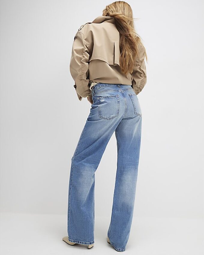 Blå slitna jeans med rak passform