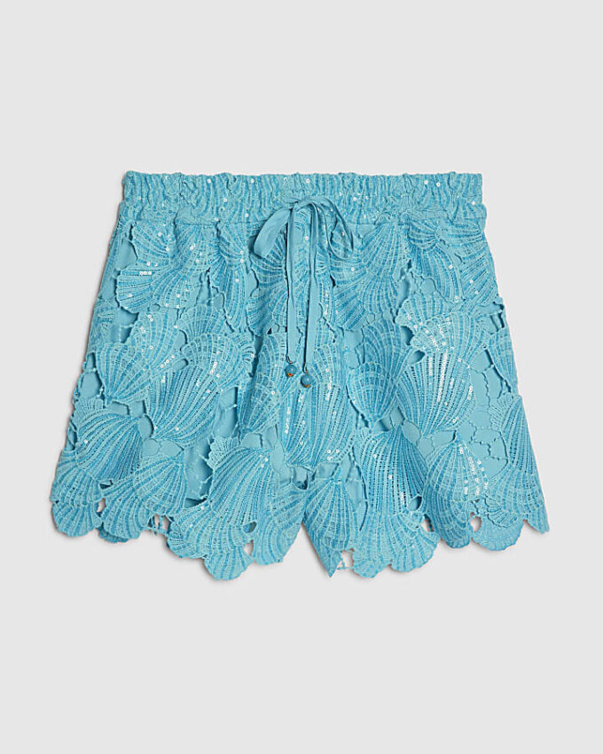 Blå strandshorts med cutwork och paljetter