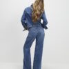 Blåa avslappnade raka jeans med slitsar