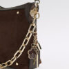 Brun crossbody-väska med kedja fram