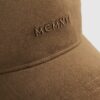 Brun MCMXII-keps i imitationsmocka