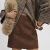 Brun minikjol i imitationsmocka