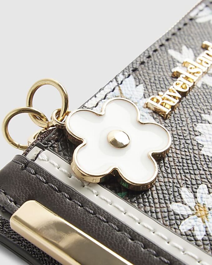 Brun miniväska med daisy-monogramtryck