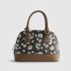 Brun monogram-tote med daisy-motiv