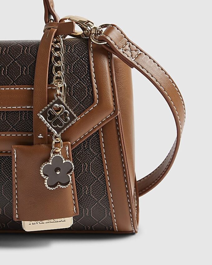 Brun monogram-tote med hänglås fram