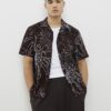 Brun oversized skjorta med blommigt repmönster