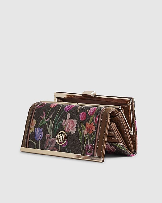 Brun plånbok med blommönster och klämfäste