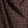 Brun rutig blus med draperad krage