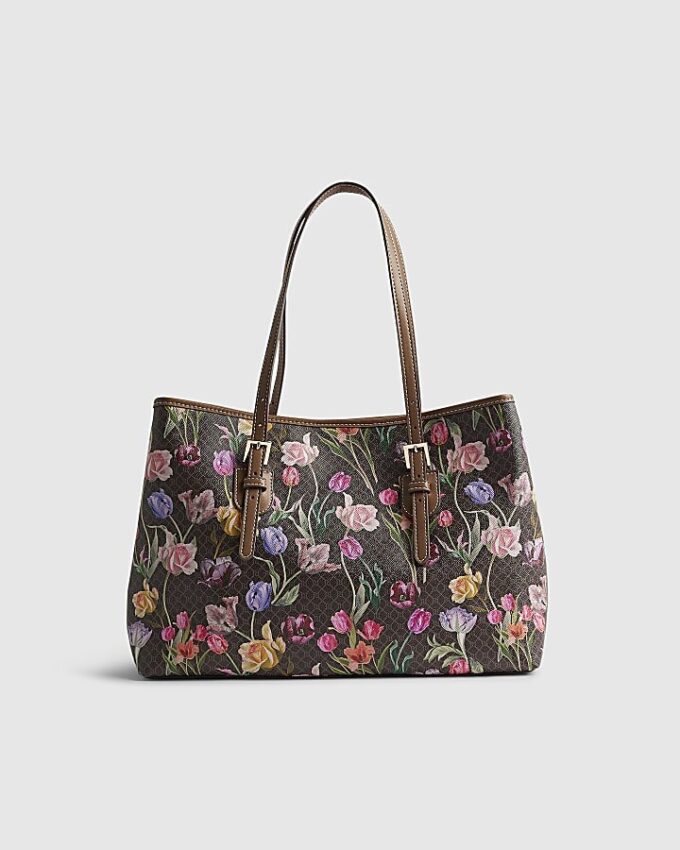 Brun shopperväska med blommigt monogram och spänne