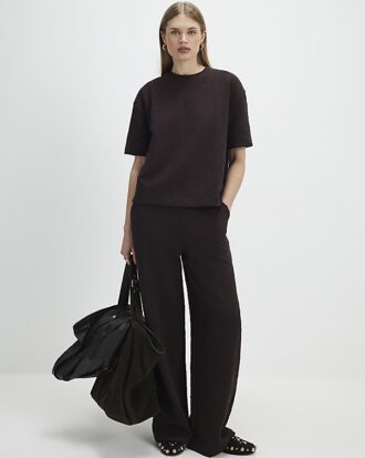 Bruna jacquardbyxor med vida ben
