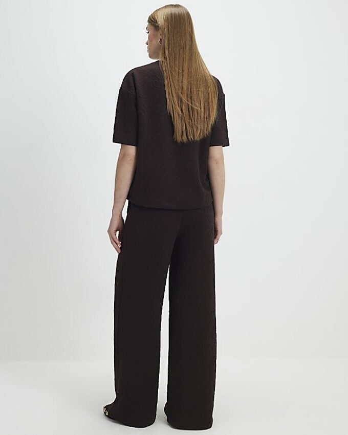 Bruna jacquardbyxor med vida ben