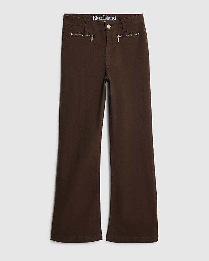 Bruna jeans med dragkedja fram och avslappnad passform