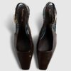 Bruna låga slingback-pumps med spetsig tå