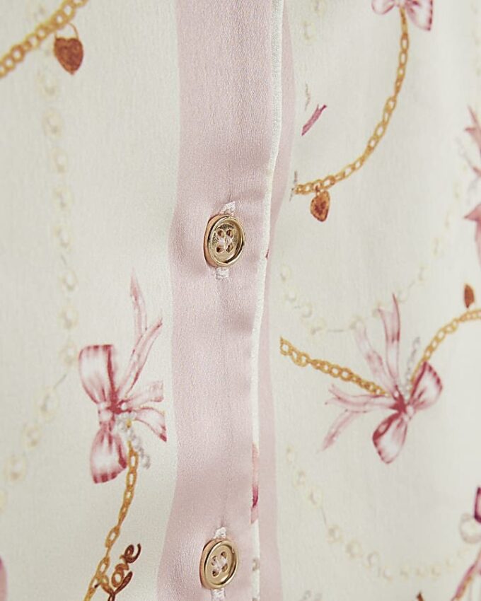 Flickor Krämfärgat pyjamas-set i satin med rosett och kedja Flickor Krämfärgat pyjamas-set i satin med rosett och kedja