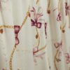 Flickor Krämfärgat pyjamas-set i satin med rosett och kedja Flickor Krämfärgat pyjamas-set i satin med rosett och kedja