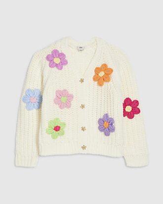 Flicktröja i krämfärg med stickade blommor