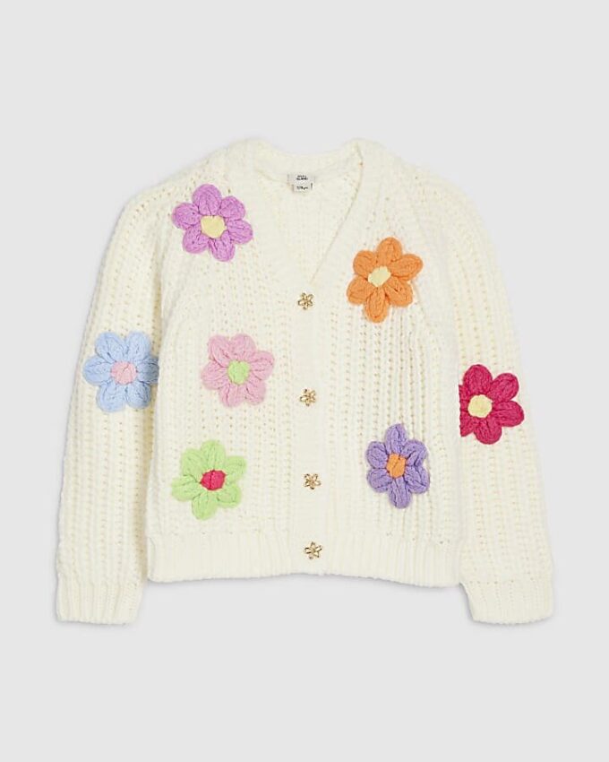 Flicktröja i krämfärg med stickade blommor