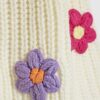 Flicktröja i krämfärg med stickade blommor