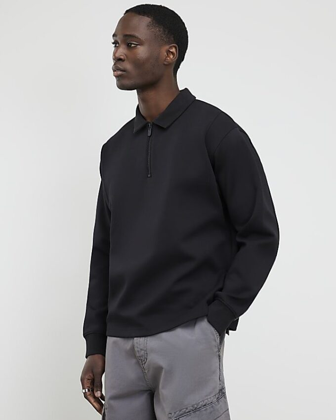Grå Luminis-polotröja i oversized-modell Grå Luminis-polotröja i oversized-modell