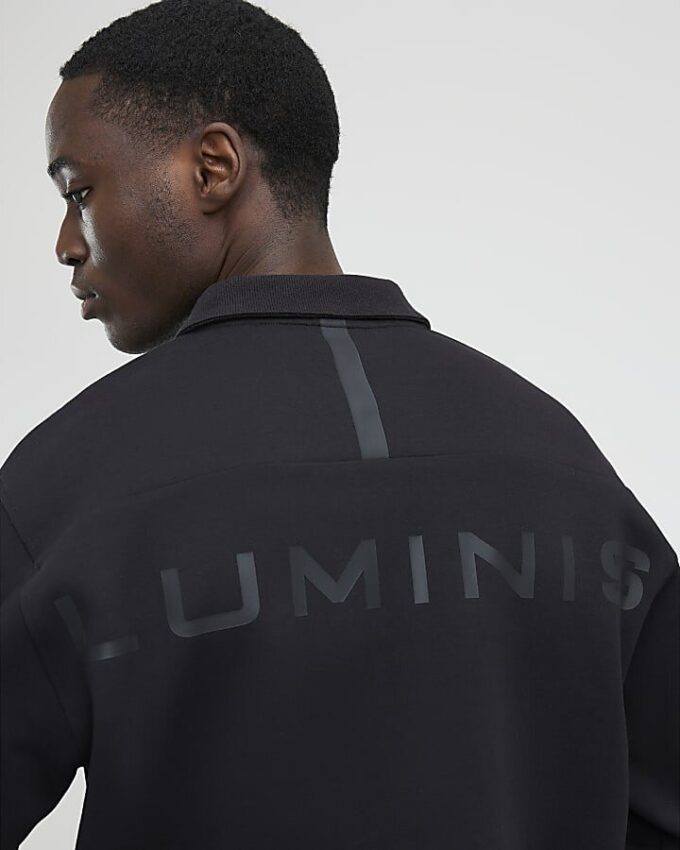 Grå Luminis-polotröja i oversized-modell Grå Luminis-polotröja i oversized-modell