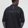Grå Luminis-polotröja i oversized-modell Grå Luminis-polotröja i oversized-modell