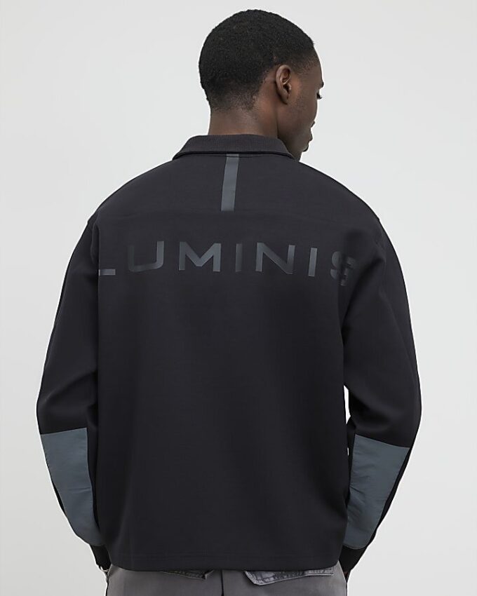 Grå Luminis-polotröja i oversized-modell Grå Luminis-polotröja i oversized-modell