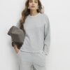 Grå mysig långärmad topp med whipstitch