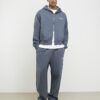 Grå oversized hoodie med dragkedja från Luminis