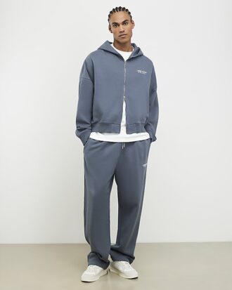 Grå oversized hoodie med dragkedja från Luminis