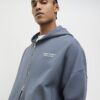 Grå oversized hoodie med dragkedja från Luminis