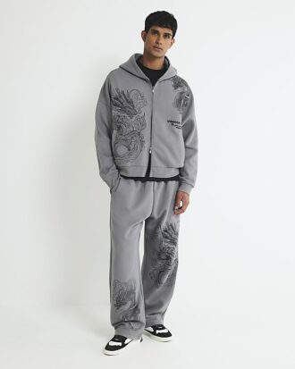 Grå oversized-passformad hoodie med dragkedja och drakmotiv