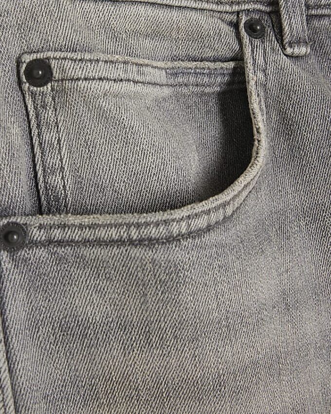 Grå tapered fit-jeans