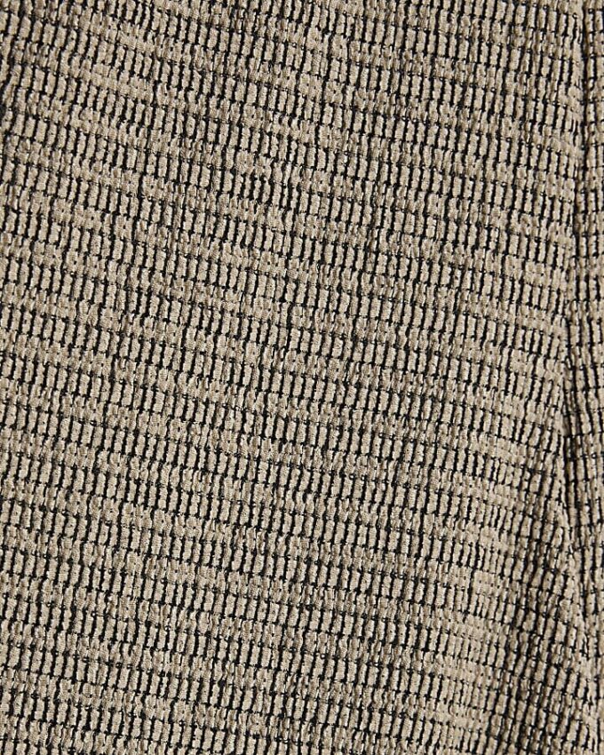 Grå texturerade byxor med vida ben