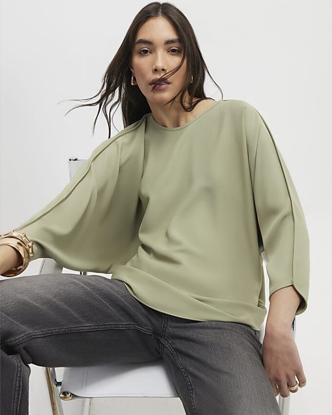 Grön långärmad batwing-top