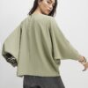 Grön långärmad batwing-top