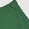 Grön wrap-skort med knappdetaljer